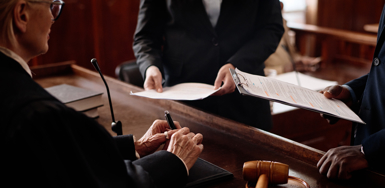 Settlement vs Trial: Weighing the Risks of Trial Photo