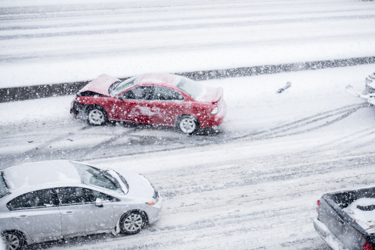 Cars driving during heavy snowfall