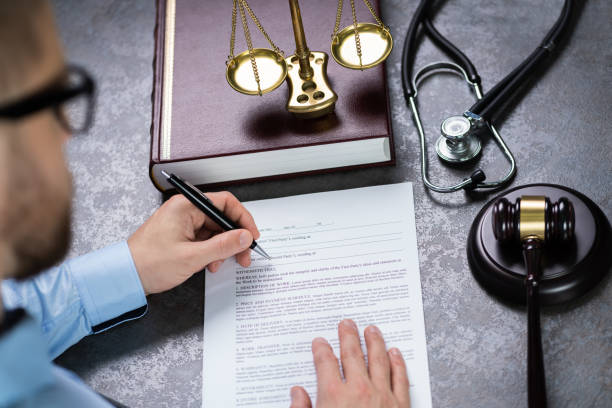 Man with paperwork for Medical Malpractice