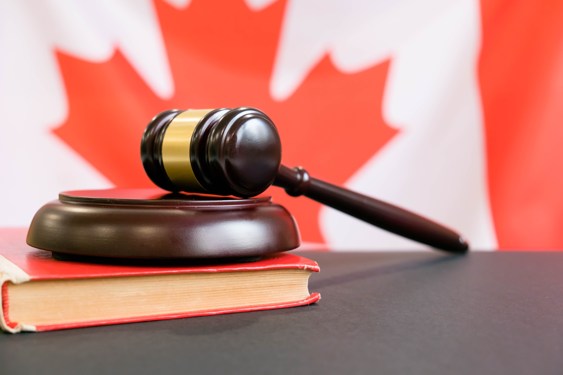 gavel with Canadian flag