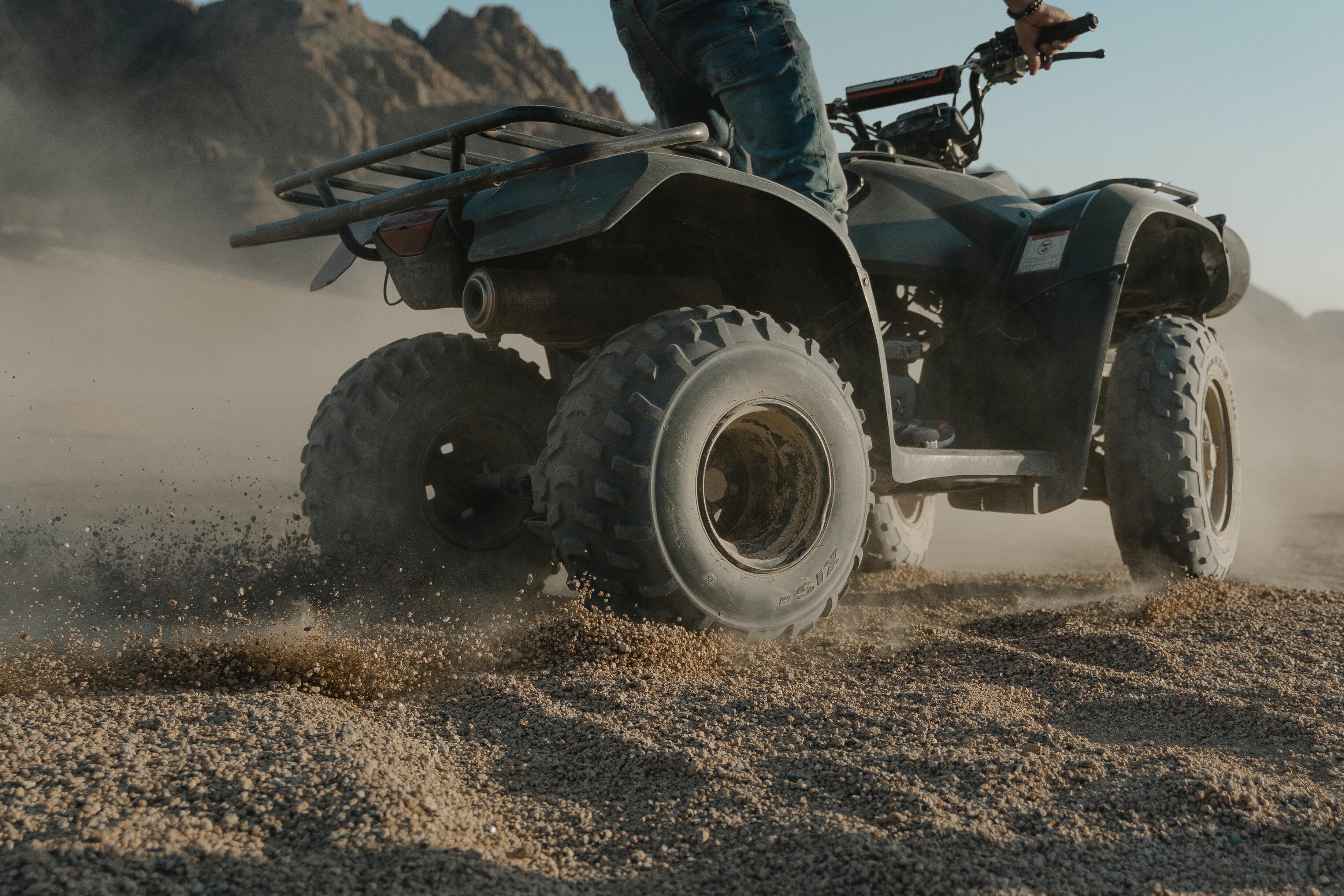 closeup of ATV on dirt