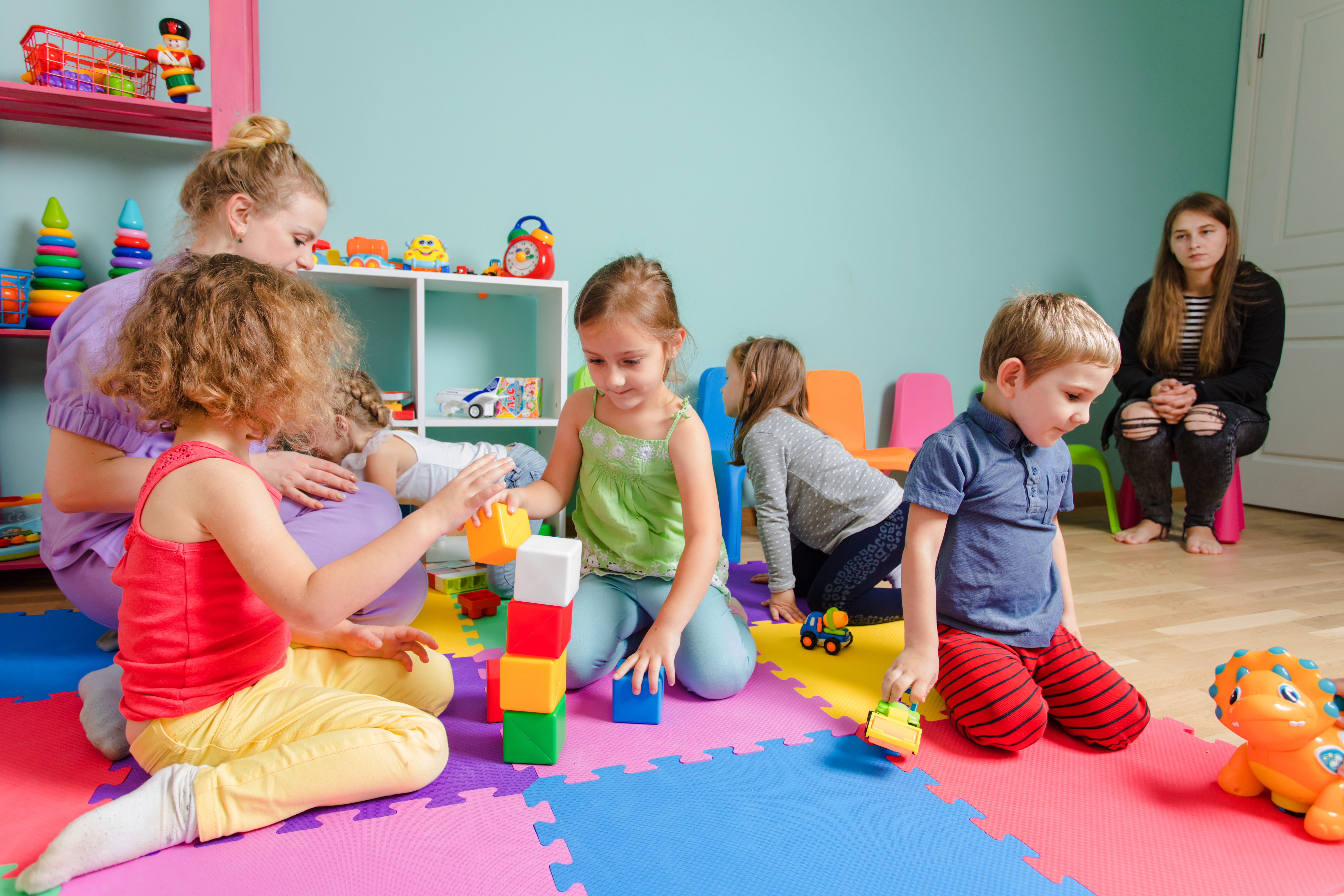 children playing with blocks at daycare