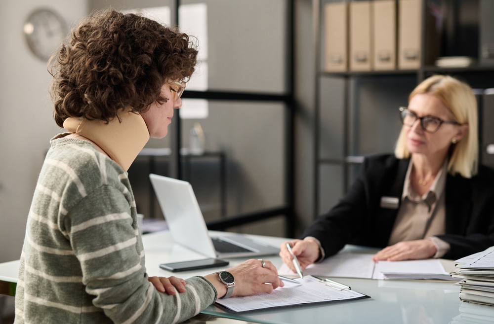 Injured woman talking to lawyer
