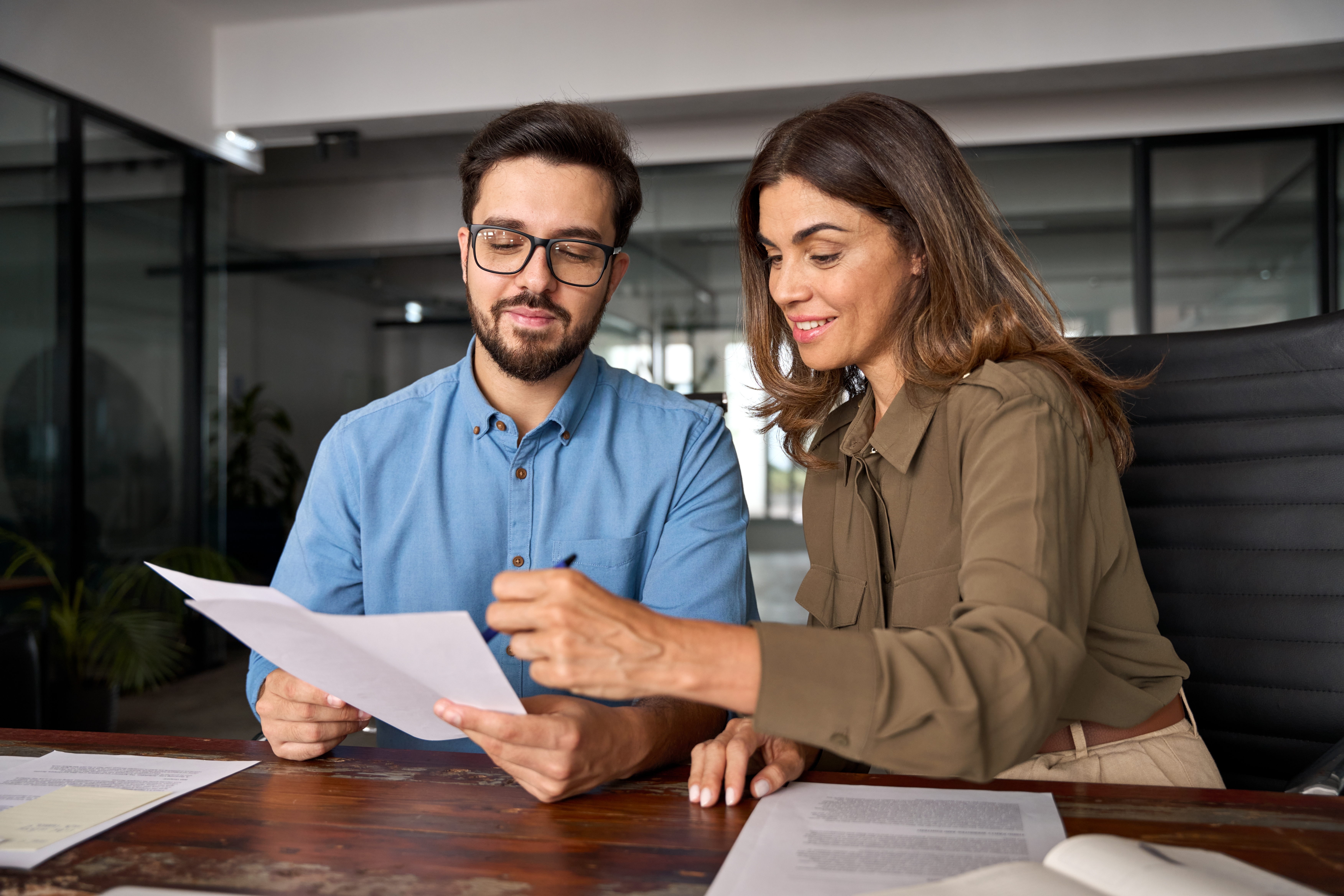 female lawyer smiling with client