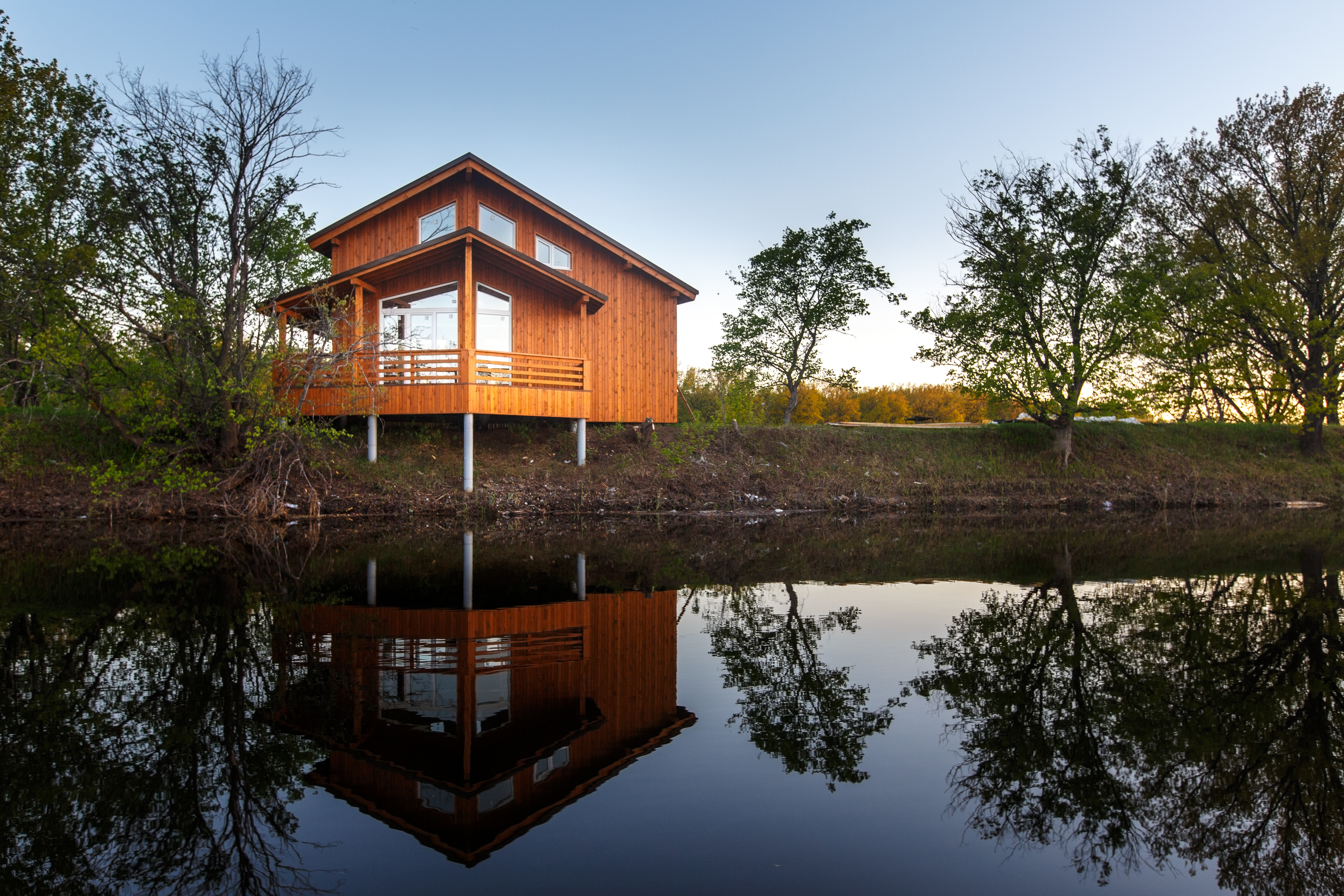 wooden cottage on canadian lake