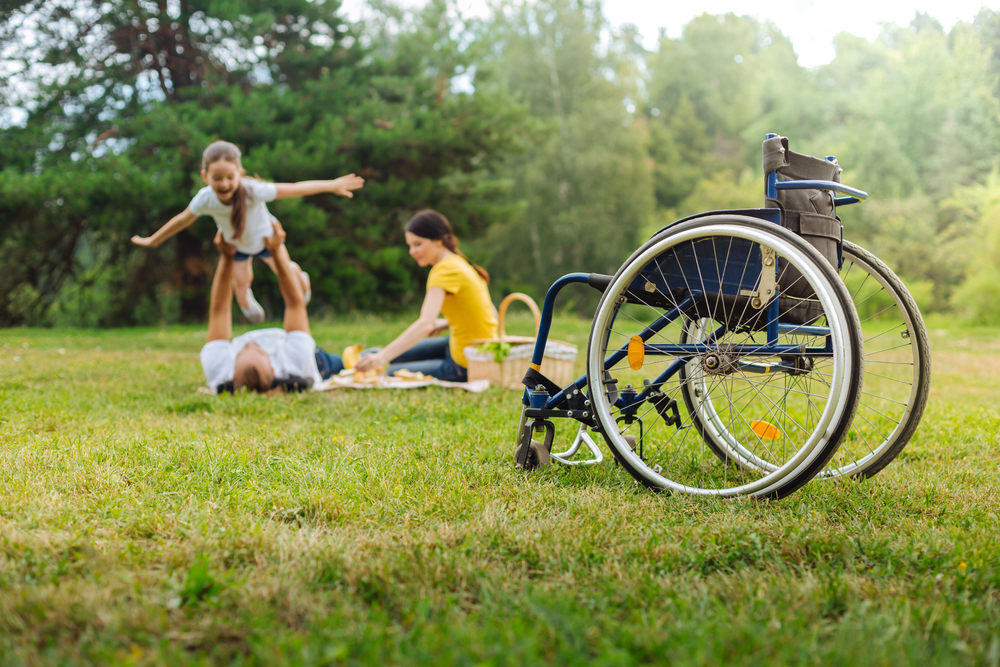Handicapped man with family